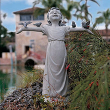 Last inn bildet i Galleri-visningsprogrammet, En liten jentestatue for hjemmehage