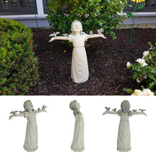 Last inn bildet i Galleri-visningsprogrammet, En liten jentestatue for hjemmehage
