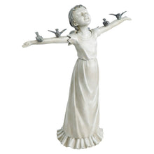 Last inn bildet i Galleri-visningsprogrammet, En liten jentestatue for hjemmehage
